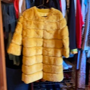 Mustard yellow faux fur coat.